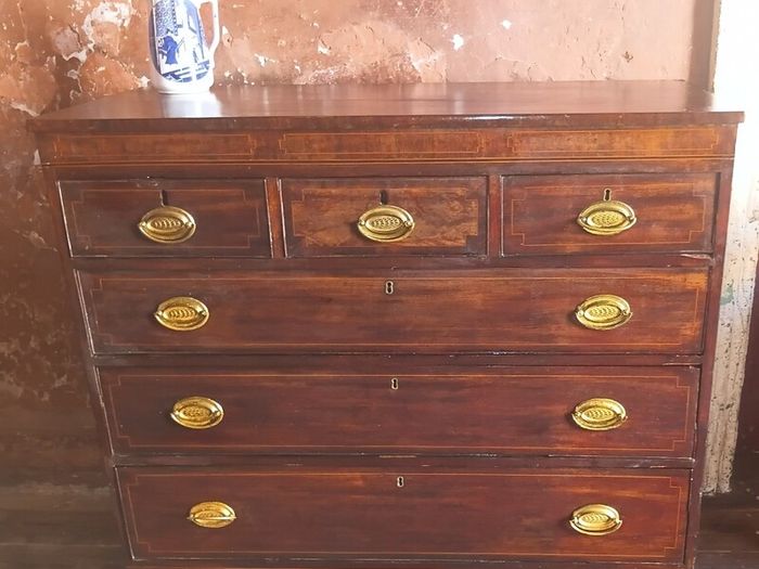 A George 111 inlaid mahogany Chest of Drawers