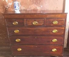 A George 111 inlaid mahogany Chest of Drawers