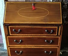 A Sheraton style inlaid mahogany Desk Bureau