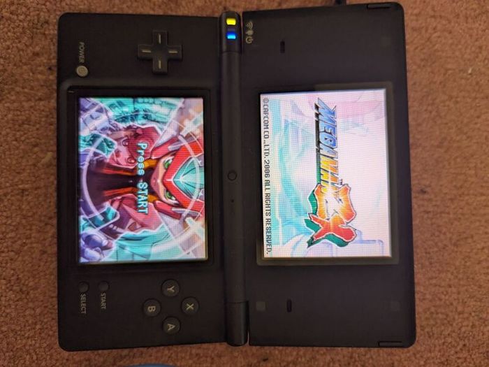 Nintendo DSi Black + Twilight Menu++ (SD Card), Mega Man ZX Game & Wrist Strap