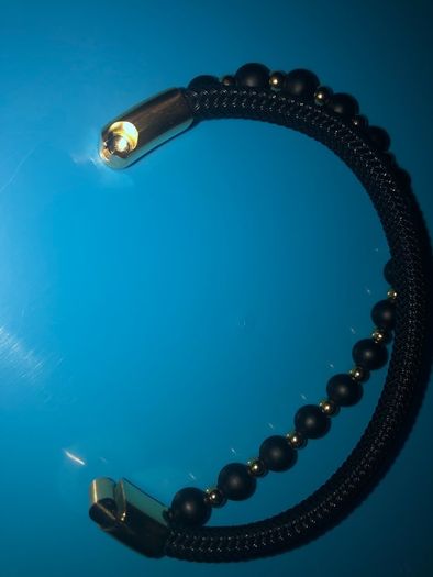Mens Bracelet black and gold brand new