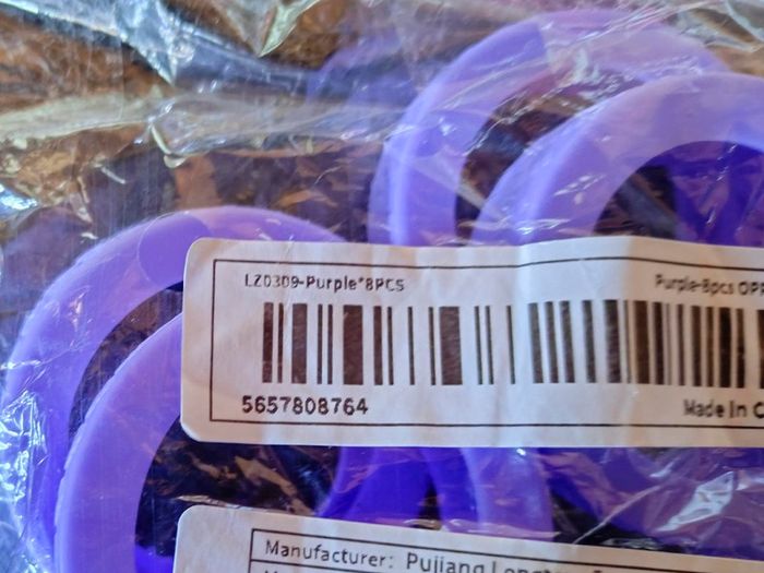 8 Purple Silicone Wheel Covers, For Luggage Case (new).