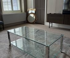 Coach House glass and stainless steel coffee table