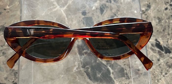 NW sun glasses