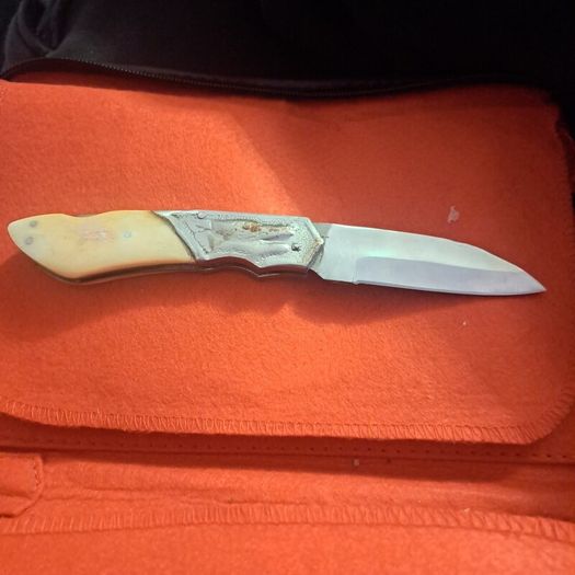 lock knife wolfhead decorative and bone handle