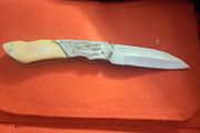 lock knife wolfhead decorative and bone handle