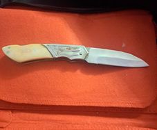 lock knife wolfhead decorative and bone handle