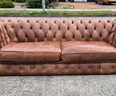 Premium leather sofa solid wood base very good condition