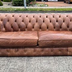 Premium leather sofa solid wood base very good condition