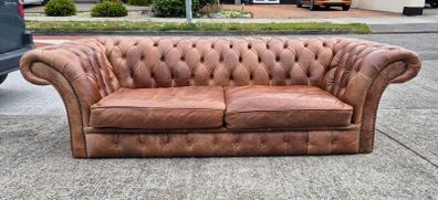 Premium leather sofa solid wood base very good condition