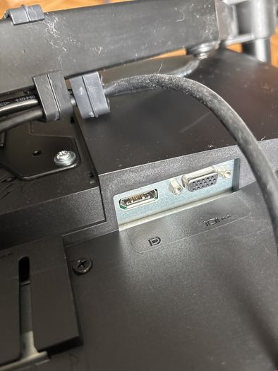 Dell monitor with adjustable stand that clamps to desk