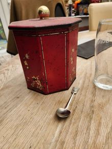 antique tea caddy and spoon