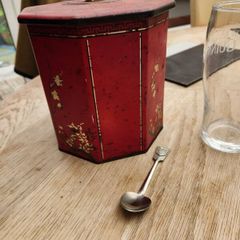 antique tea caddy and spoon