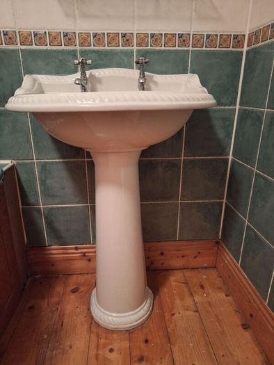 bathroom sink and pedestal