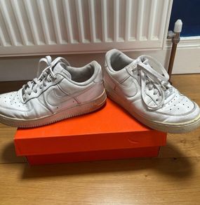 white Nike airforce trainers