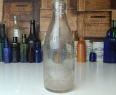 504 - Vintage Clear Glass Cork Top Collectible Decorative Springmount Milk Bottle