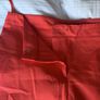 Dunnes red trousers Image 3