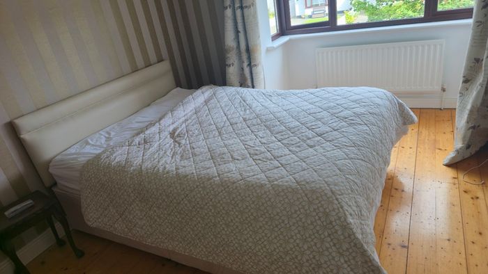 Double beds and kitchen seats