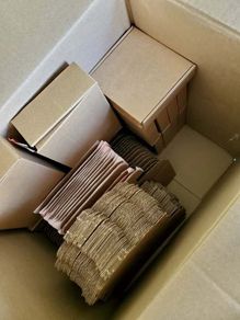 Brown postal boxes + clear cello biodegradable bags