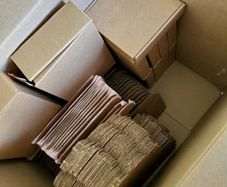 Brown postal boxes + clear cello biodegradable bags