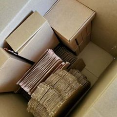 Brown postal boxes + clear cello biodegradable bags
