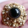 Vintage Victorian revival gold  layered domed brooch with black glass and faux pearls Image 8