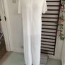 long tunic with side slits Bnwt.  Short sleeve white with black logo Image 6