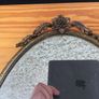 Brass framed ornate oval mirror Image 3