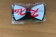 White with black bow tie