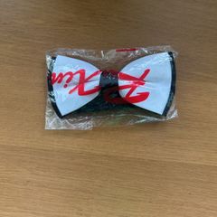 White with black bow tie