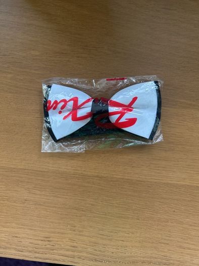 White with black bow tie