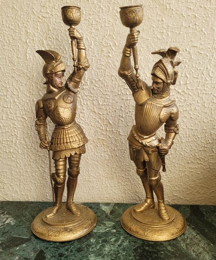 Antique pair of painted & gilded knights in armour candleholders