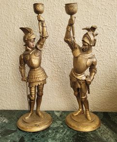 Antique pair of painted & gilded knights in armour candleholders