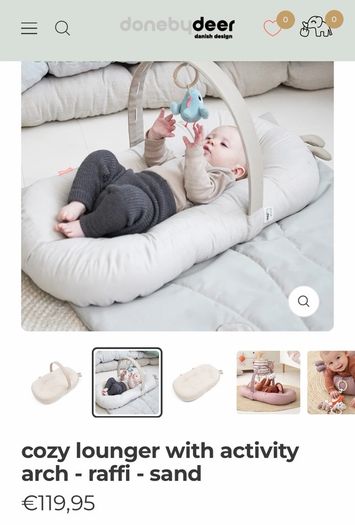 Cozy lounger with activity arch - Done By Deer