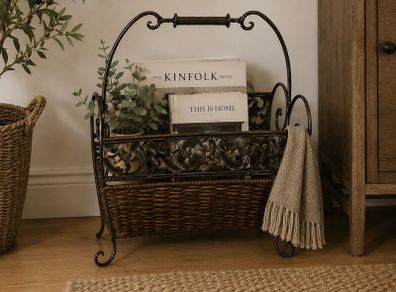 Antique iron and wicker magazine rack. Vintage antique magazine rack.