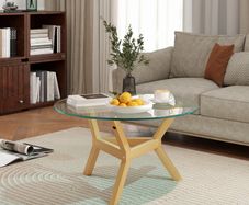 Round side table made of tempered glass with adjustable foot pads and steel frame