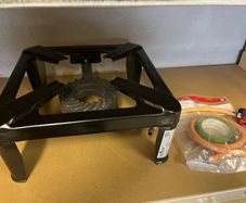 Heavy duty cast iron gas boiling ring stove.