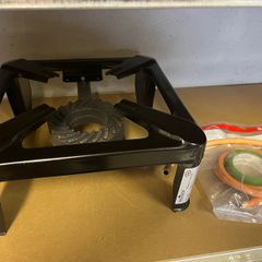 Heavy duty cast iron gas boiling ring stove.
