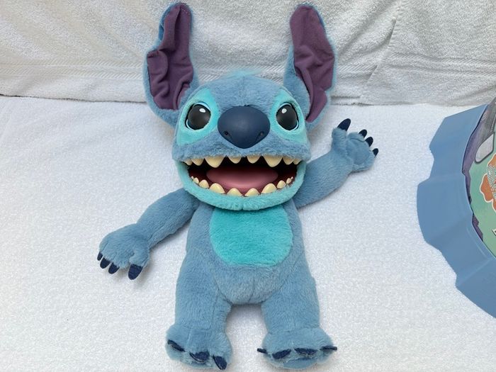 Disney Stitch Real FX Puppet 100 Sounds Only 2 left! Hurry and get the perfect toy for your child!