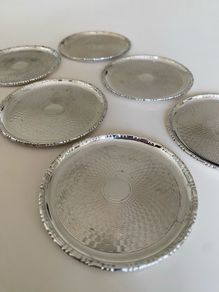 Set of six silver plated coasters