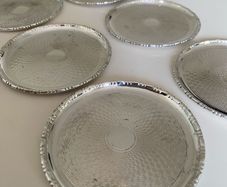 Set of six silver plated coasters