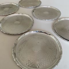 Set of six silver plated coasters
