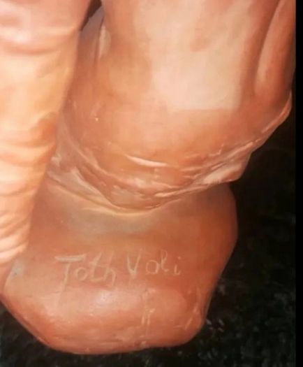 Large signed terracotta statue