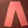Orange cargo trousers. Image 2