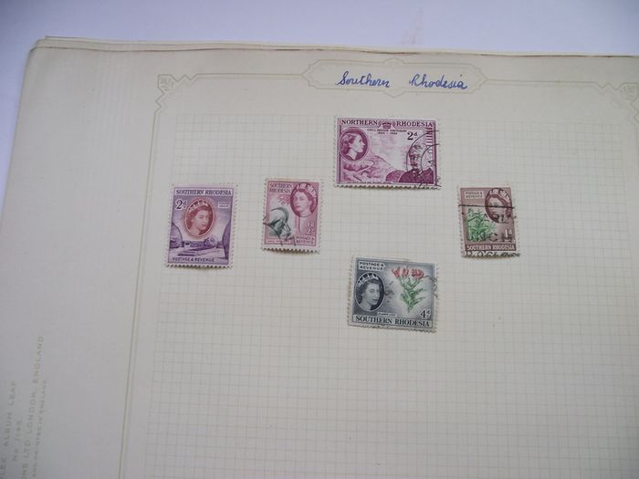 A collection of stamps from Northern Rhodesia, Southern Rhodesia, Rhodesia, South Africa and Nyasaland on loose pages
