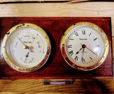 vintage barometer and clock