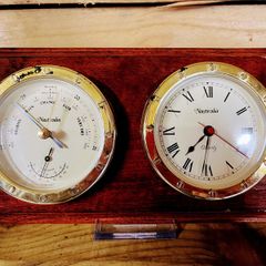 vintage barometer and clock