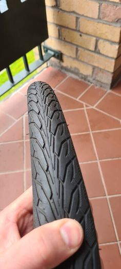 Bike tyre MITAS puncture protection with reflection on the side