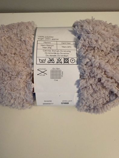 5 balls of grey yarn wool