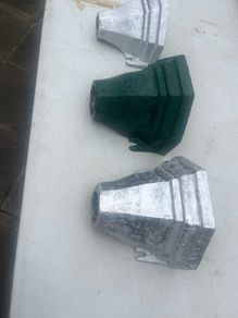 3 water hoppers converted to plant holders. With drainage